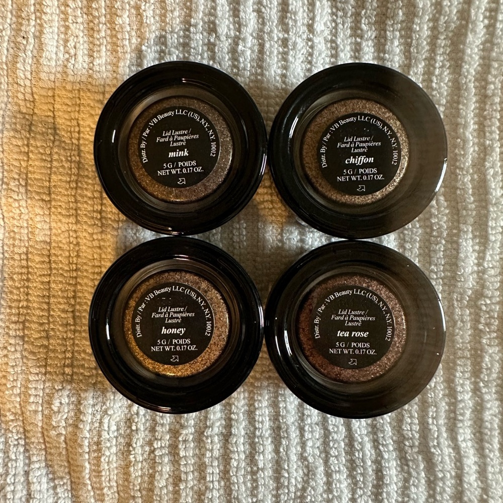 4 Victoria Beckham Lid Lustres in Mink, Chiffon, Tea Rose, and Honey.